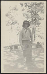 Man in a sack at camp at El Rito de los Frijoles, New Mexico