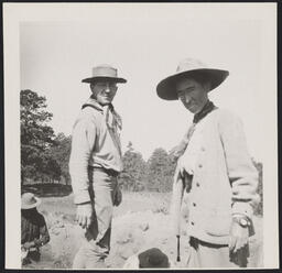 Frederick Webb Hodge with a woman, and Native American me, likely from San Ildefonso Pueblo, at excavation site at El Rito de los Frijoles, New Mexico