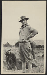 Frederick Webb Hodge with Native American man, likely from San Ildefonso Pueblo, at an excavation site. El Rito de los Frijoles, New Mexico