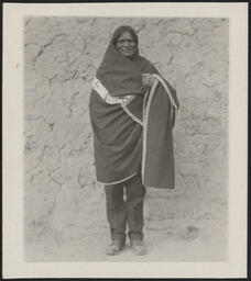 A Native American man (Agauono/Juan B. Gonzales?) wrapped in a blanket, New Mexico